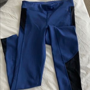 Aether blue leggings with black trim. Cropped. Sm